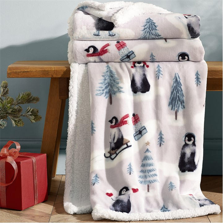 Catherine Lansfield Red/Green Christmas Sherpa Penguins Throw 130X170cm - Natural - Image 3