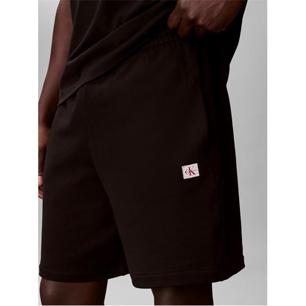 Black - Calvin Klein Jeans - Men's Woven Badge Fleece Jogger Shorts