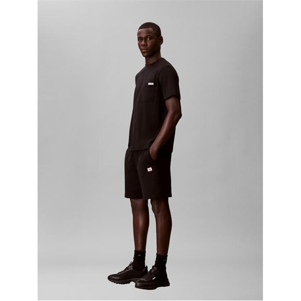 Black - Calvin Klein Jeans - Men's Woven Badge Fleece Jogger Shorts