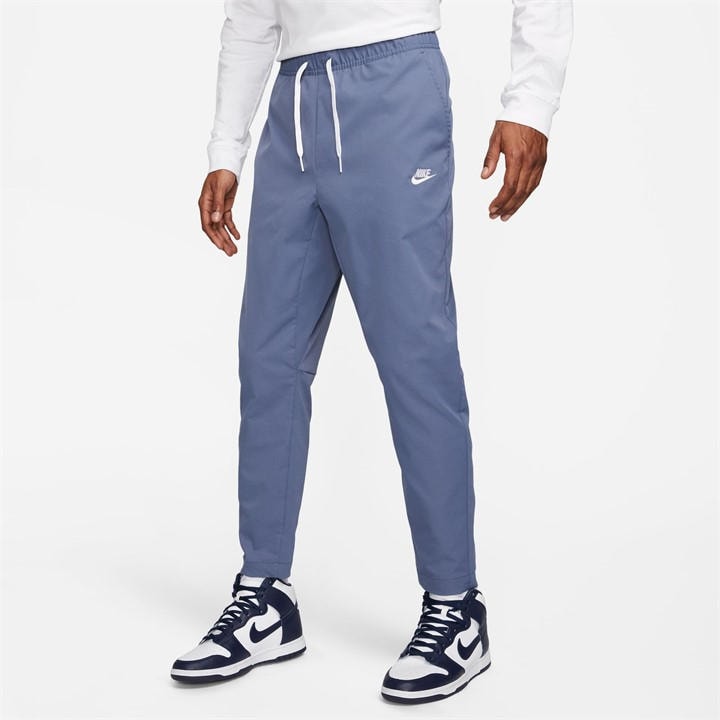 Nike Men' Blue Club Woven Tapered Joggers in Size S, Sports Direct