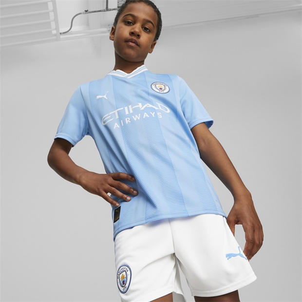 01 - Puma - MCFC Home Jersey Replica Jr